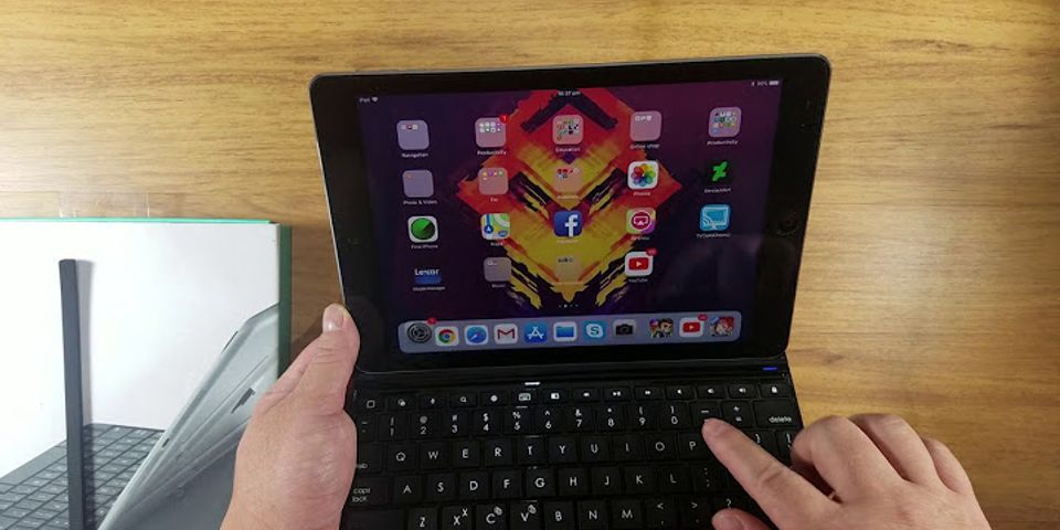 How do I get my iPad to recognize my Logitech keyboard?